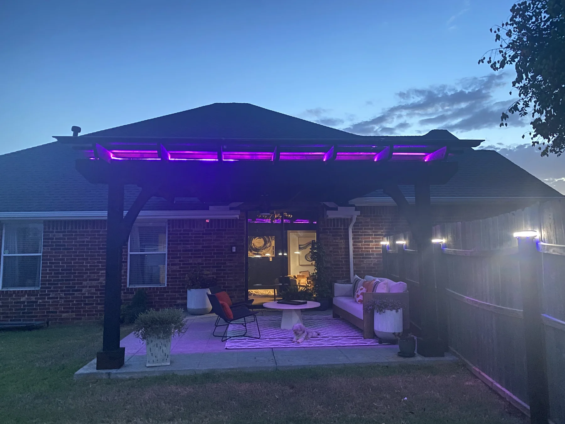Purple LED lighting on pavilion pergola at dusk — Pergola Jack OKC