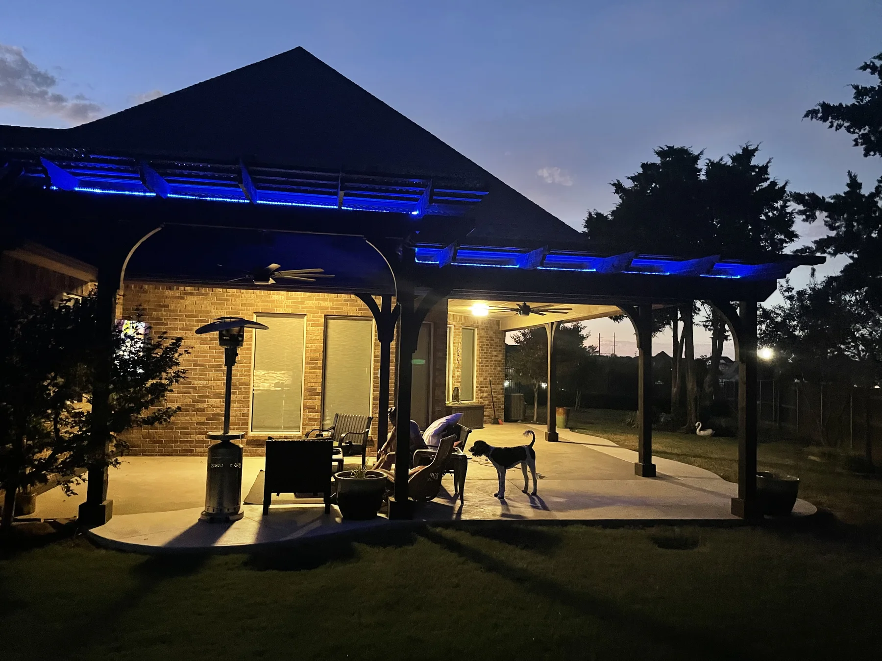 Blue LED lighting on double-bay pergola at dusk — Pergola Jack Oklahoma City