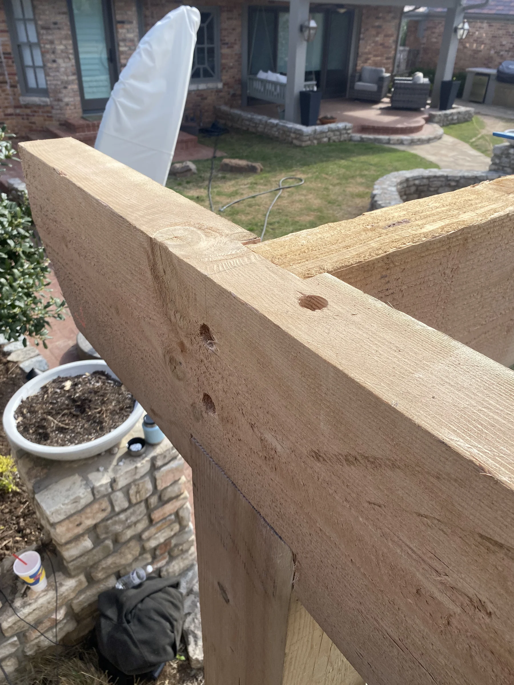 Post and beam corner joint — zero exposed hardware on any connection